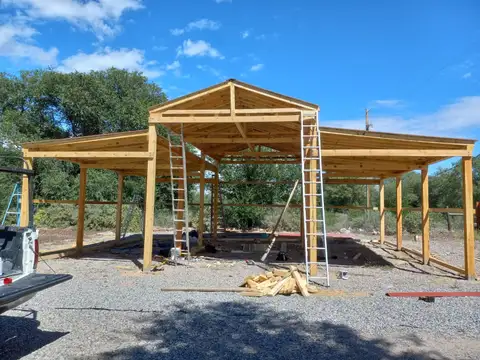 Wide carport structure framed by CyJ Tree Service And Handyman near Espanola, NM